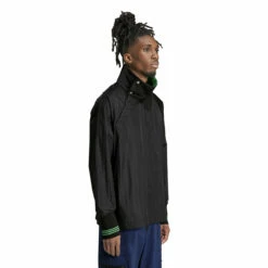 Adidas X Wales Bonner Statement Nylon Track Top In Black 7 Adidas X Wales Bonner Statement Nylon Track Top In Black -Hervia Shop hervia.com wb nylon top col. black 1699283396IT9775 7 APPAREL On Model Walking View white