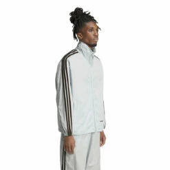 Adidas X Wales Bonner Statement Nylon Track Top In White 10 Adidas X Wales Bonner Statement Nylon Track Top In White -Hervia Shop hervia.com wb nylon tt col. blutin 1699286103IT9783 7 APPAREL On Model Walking View white