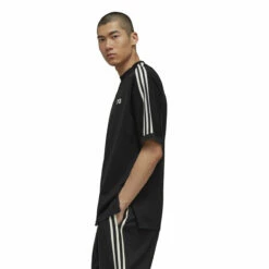 Y-3 3-Stripes Short Sleeved T-Shirt In Black -Hervia Shop hervia.com y 3 h63065 3s ss tee col. black owhite 3 stripes short sleeved t shirt 1691584288H63065 5 APPAREL On Model Side View white