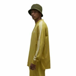 Y-3 Y-3 Stripes Long Sleeve Tee In Yellow 9 Y-3 Y-3 Stripes Long Sleeve Tee In Yellow -Hervia Shop hervia.com y 3 iq1789 3s ls tee col. blayel owhite y 3 stripes long sleeve tee 1691580758IQ1789 5 APPAREL On Model Side View white