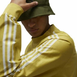 Y-3 Y-3 Stripes Long Sleeve Tee In Yellow 11 Y-3 Y-3 Stripes Long Sleeve Tee In Yellow -Hervia Shop hervia.com y 3 iq1789 3s ls tee col. blayel owhite y 3 stripes long sleeve tee 1691580763IQ1789 7 APPAREL On Model Detail View 1 white