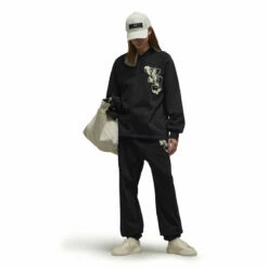 Y-3 Graphic Logo French Terry Crew Sweater In Black -Hervia Shop hervia.com y 3 iq2130 gfx ft crew col. black blayel graphic logo french terry crew sweater 1691574522IQ2130 7 APPAREL On Model Walking View white