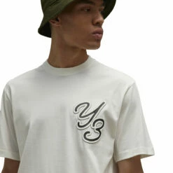 Y-3 Graphic Short Sleeve Tee In Off White -Hervia Shop hervia.com y 3 it7522 gfx ss tee col. owhite graphic short sleeve tee 1695992270IT7522 8 APPAREL On Model Detail View 1 white