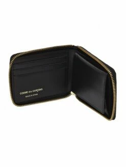 Comme Des Garçons Wallet SA7100EL Logotype Embossed Wallet Black In Black
